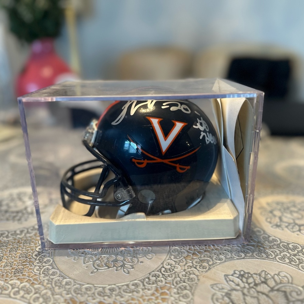 Thomas Jones autographed mini helmet